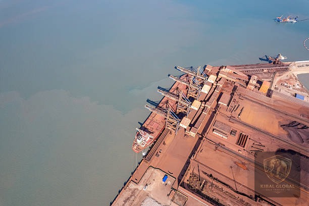 Bulk carrier loading iron ore at African export port
